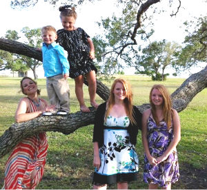 UTA grad Kelly Ward with her four kids