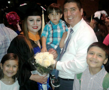 Adrienne with her family at graduation